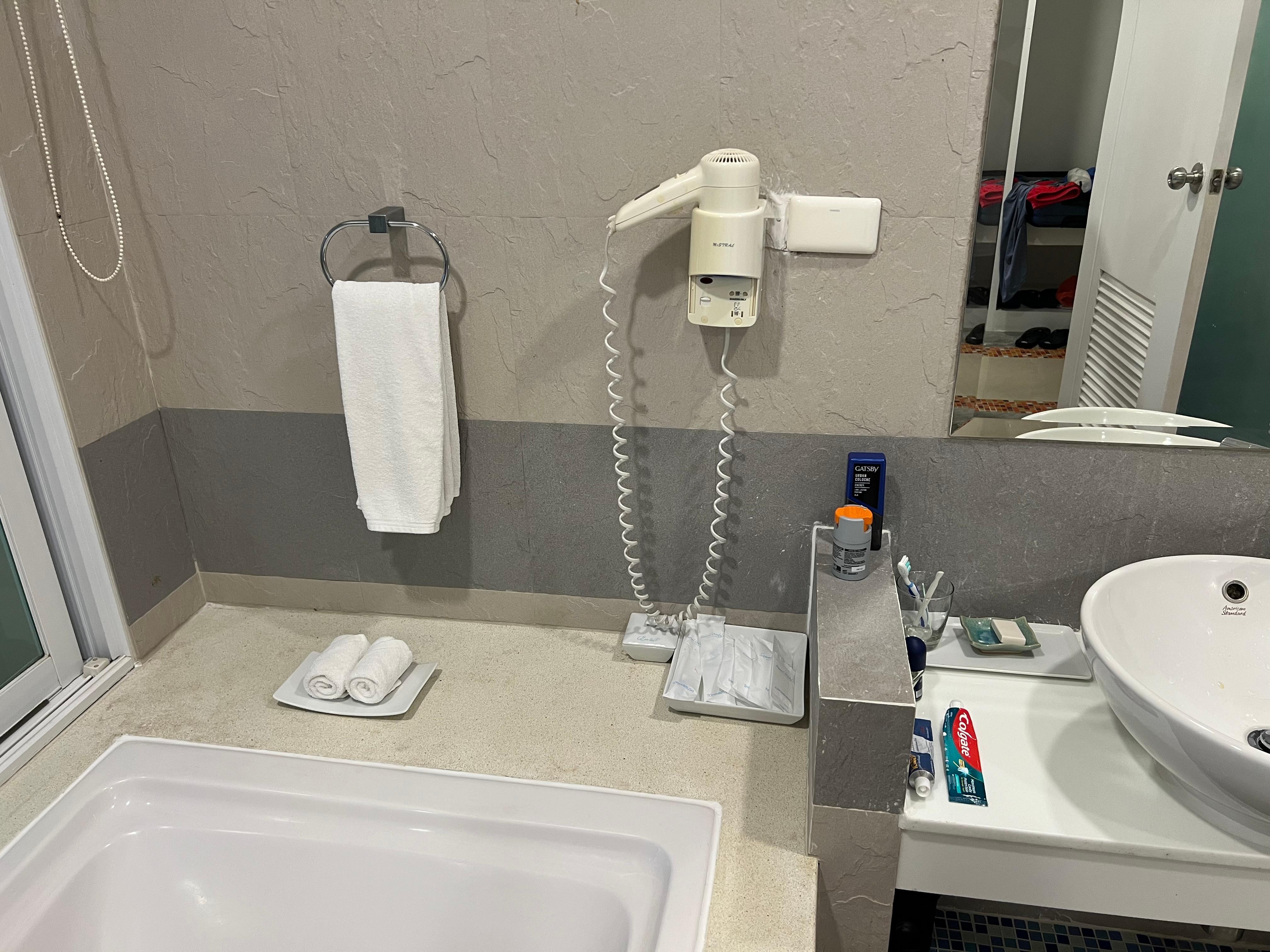 Position of the Hand towel & hair dryer totally inappropriate 