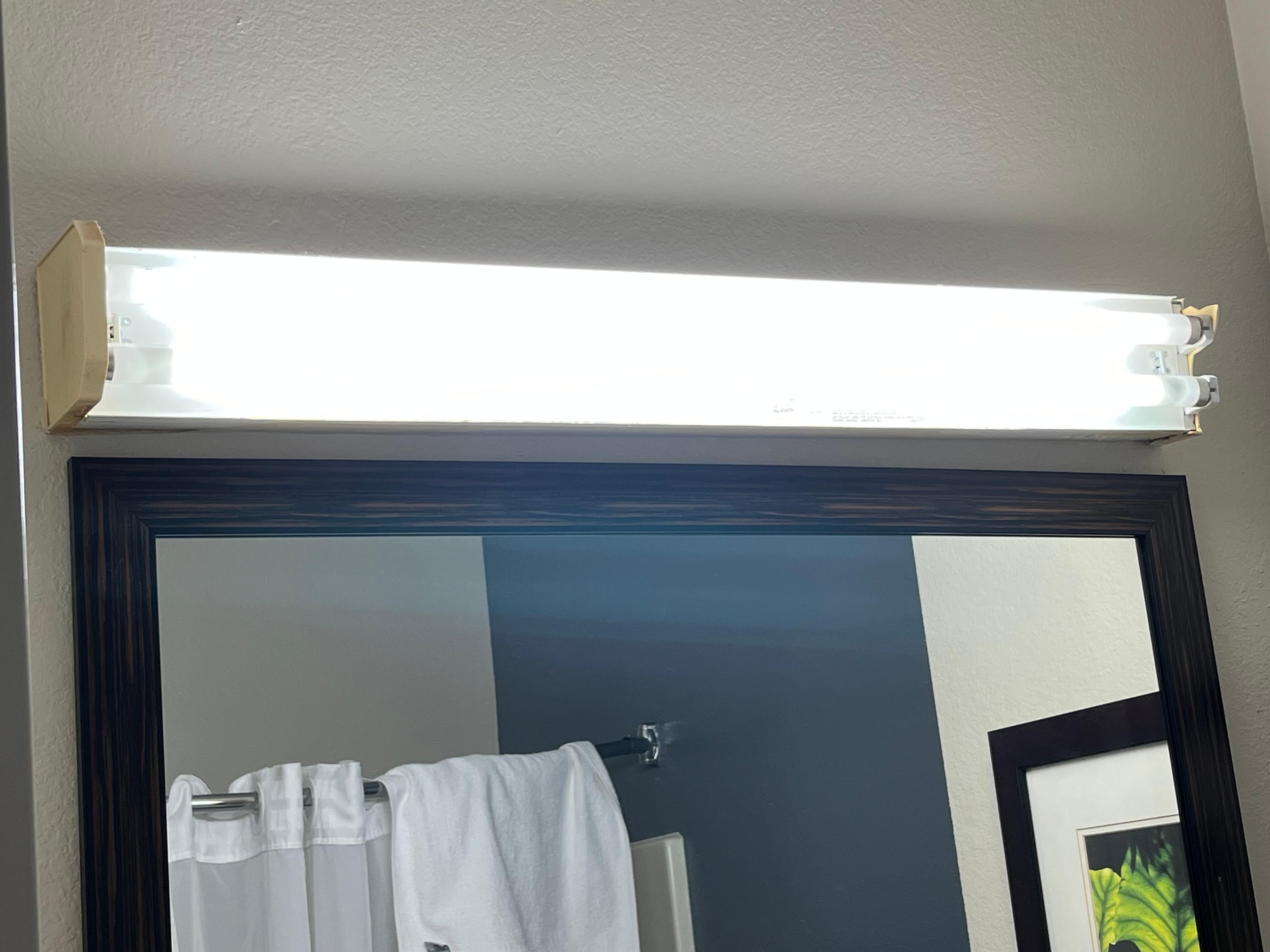 Bathroom neon lights exposed/no shade