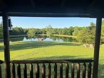 View from the back covered porch where I spent time every morning in the double rocker/swing.