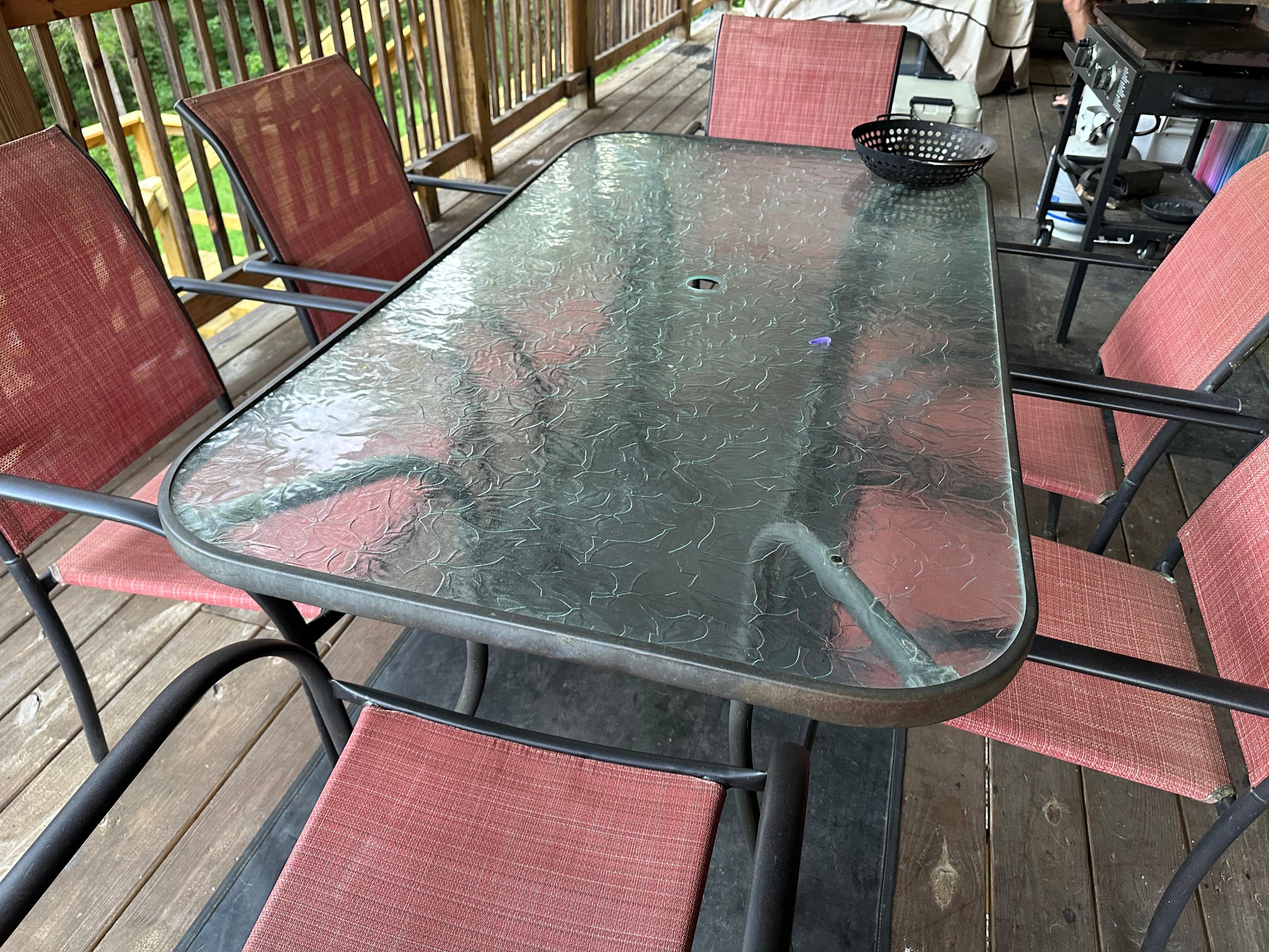 The table and chairs in the back deck were covered in a filthy grime. Nothing was clean or inviting.