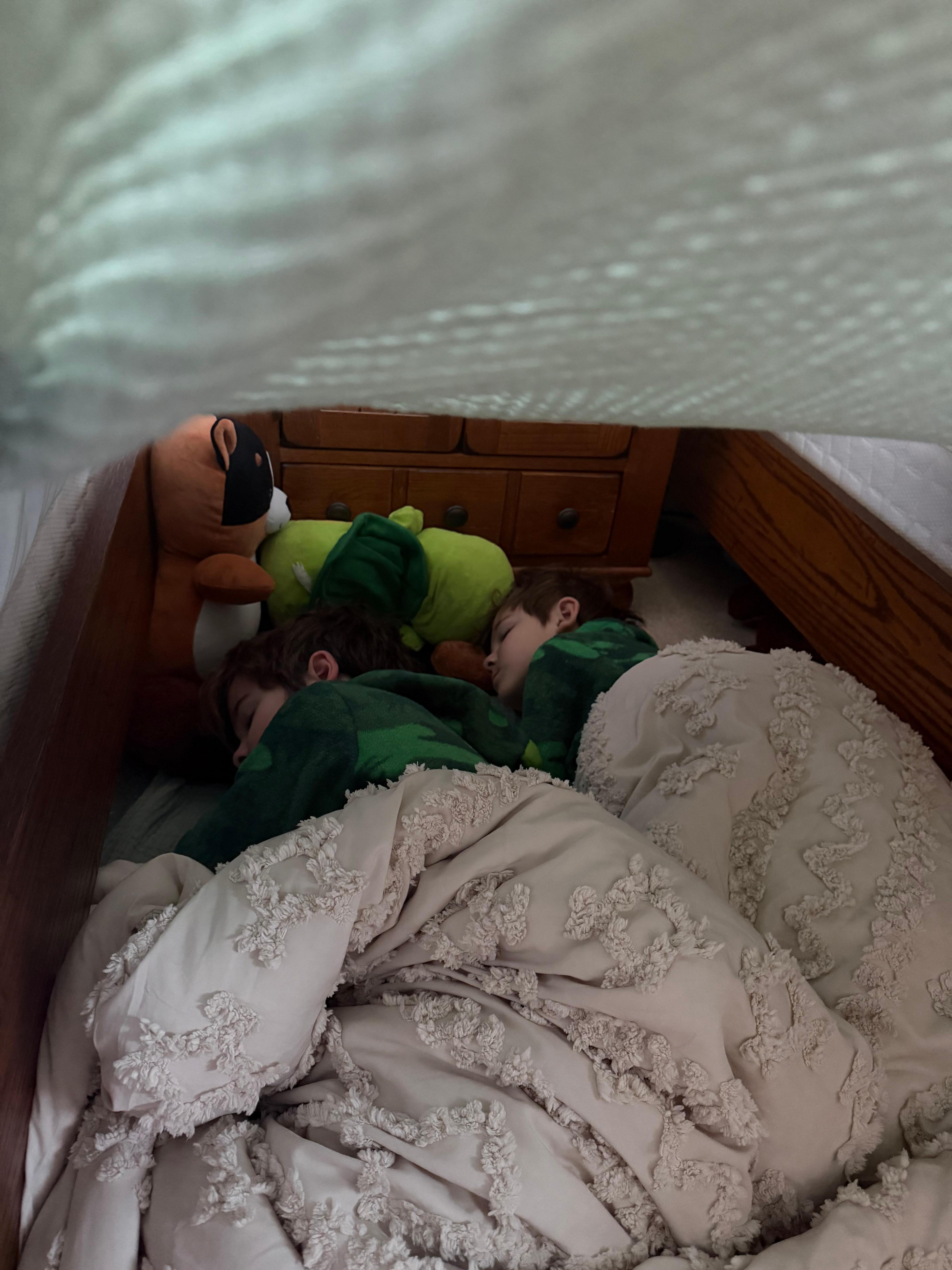 On the last night- they begged to make a fort between the two twin beds. It was so cozy they slept there all night! Sweet setup for boys! 