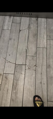 Cravked floor in elevator