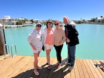 On the dock in the back where we watched manatees in the canal