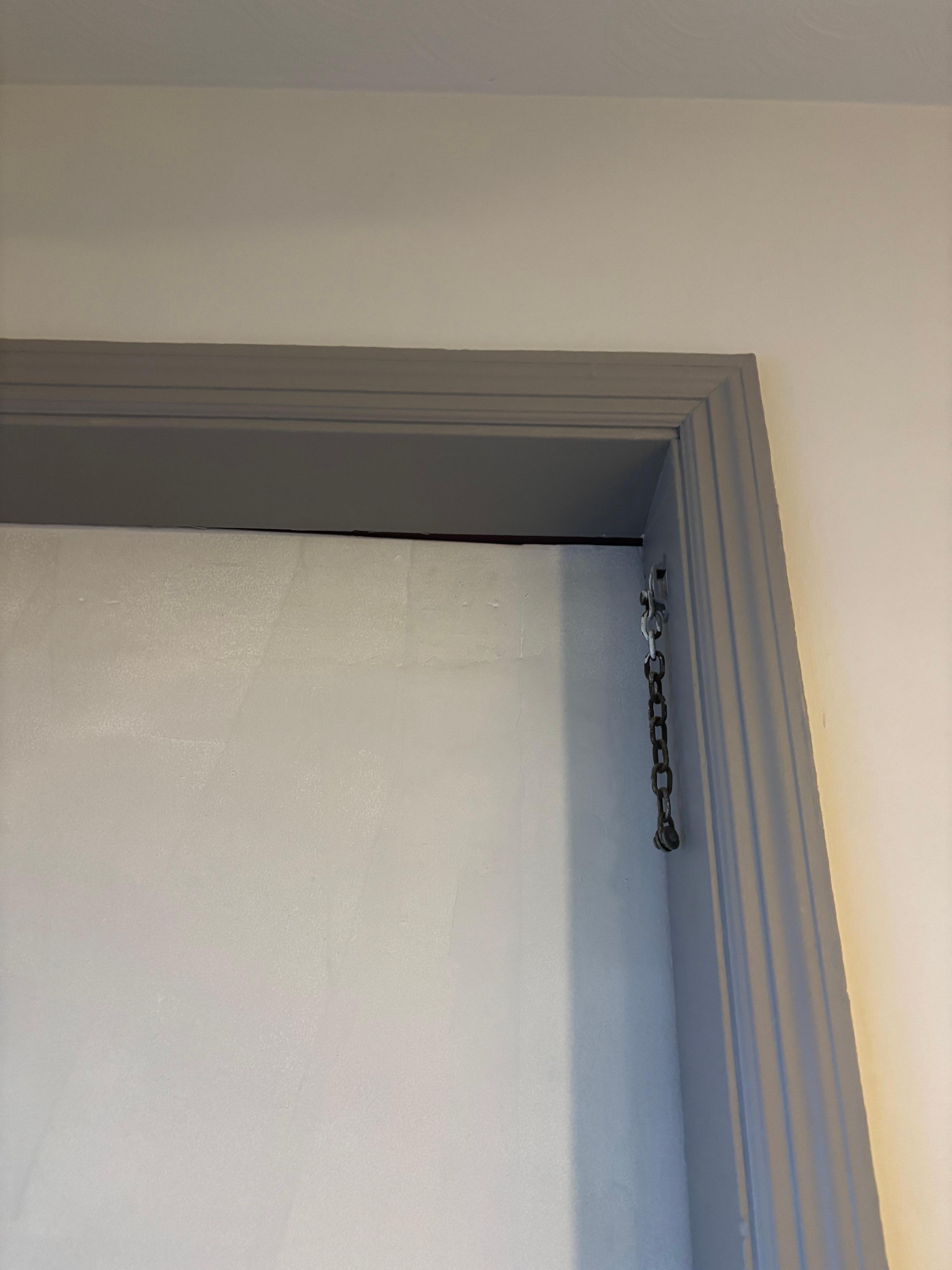 The gap is right about the door handle and lock