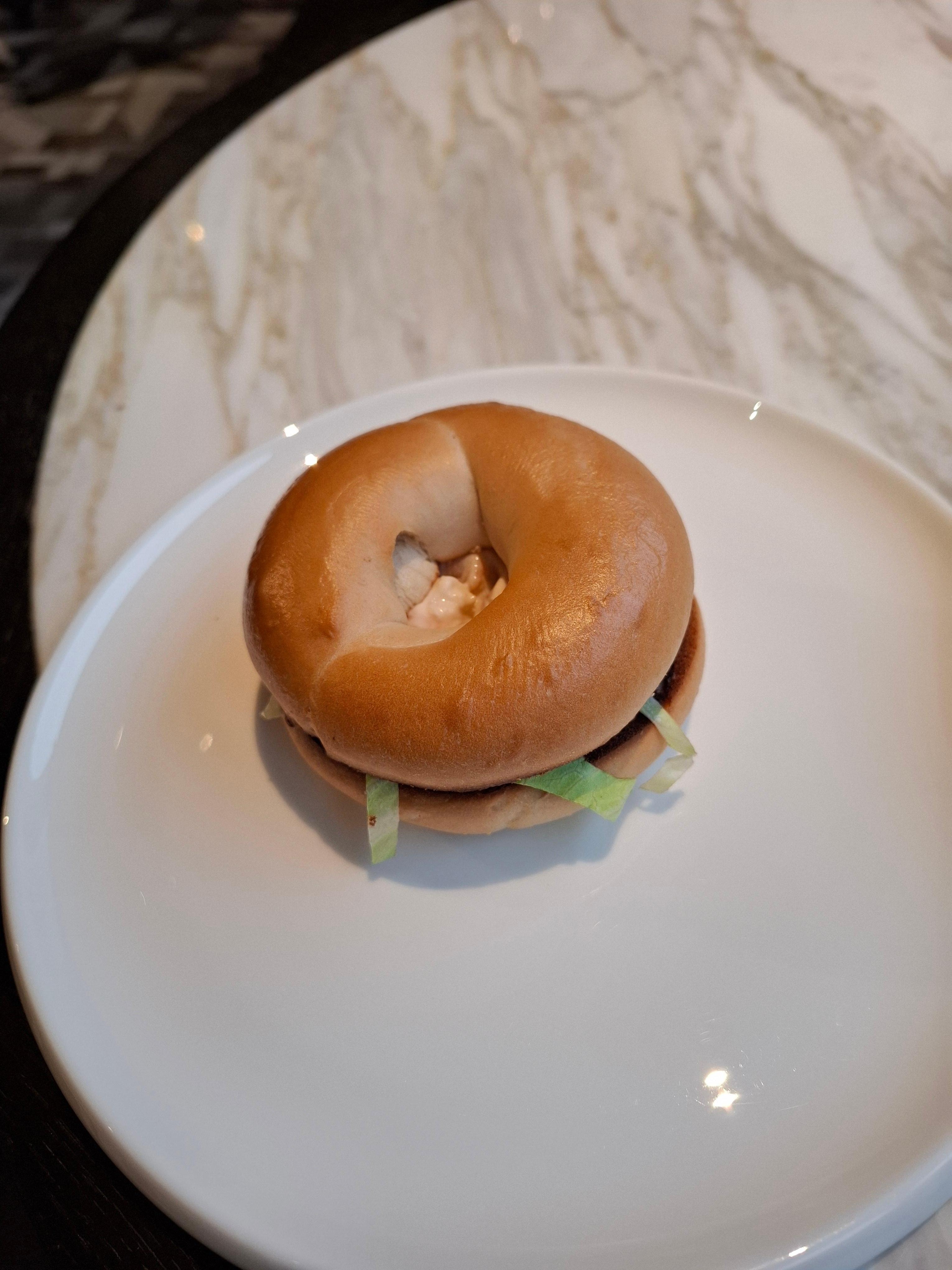 Mini bagel as main course in the buffet breakfast.  The following days,  there's were only boiled eggs,  scrambled eggs and fried eggs. Seems they had them already done for a while 