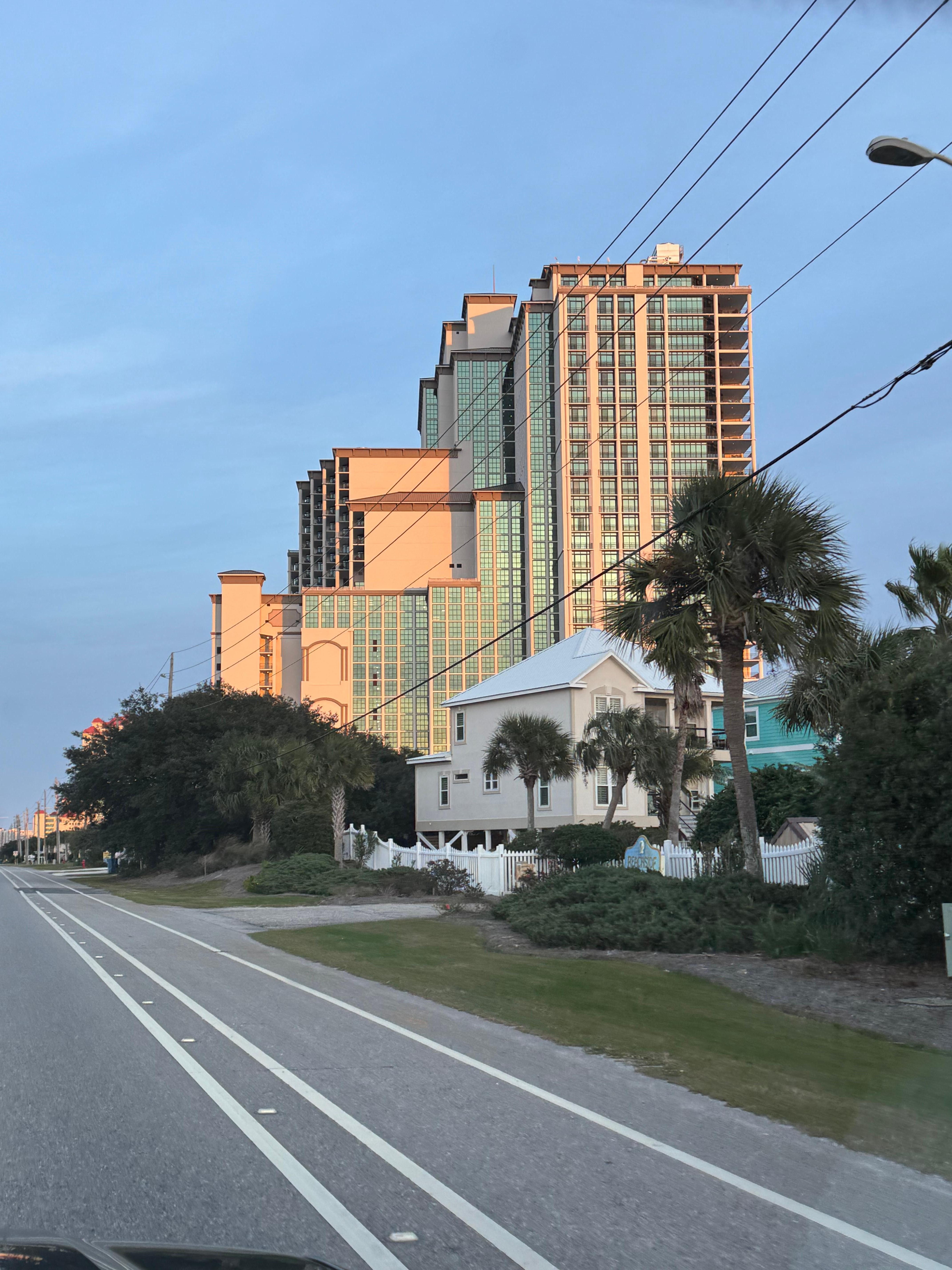 View of building from west, down the road.