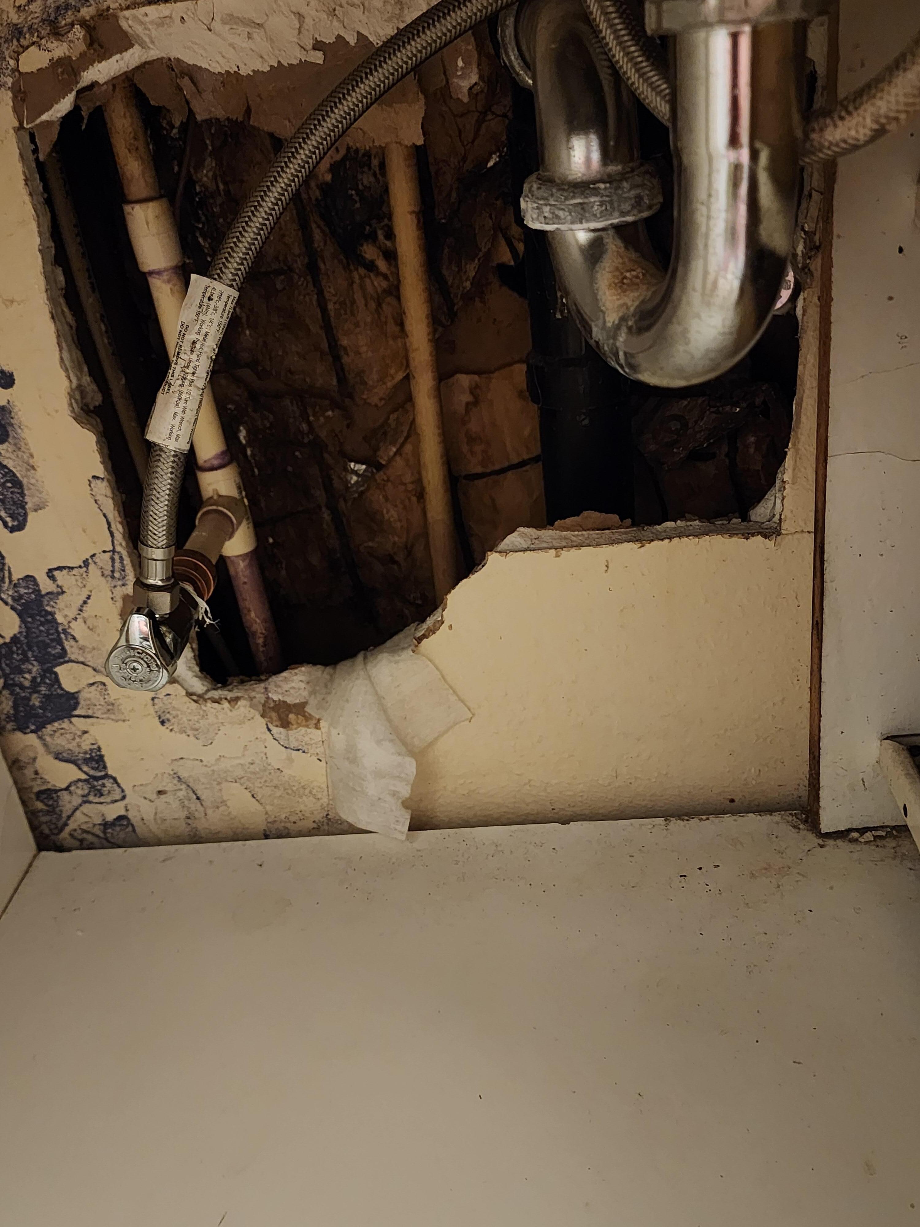 Hole under sink