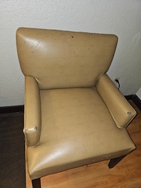 Chair full of scratches and rips
