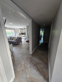 Hall leading to bedrooms & bath