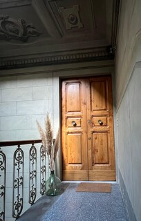 There is an elevator (lift) with just a few steps to the apartment.