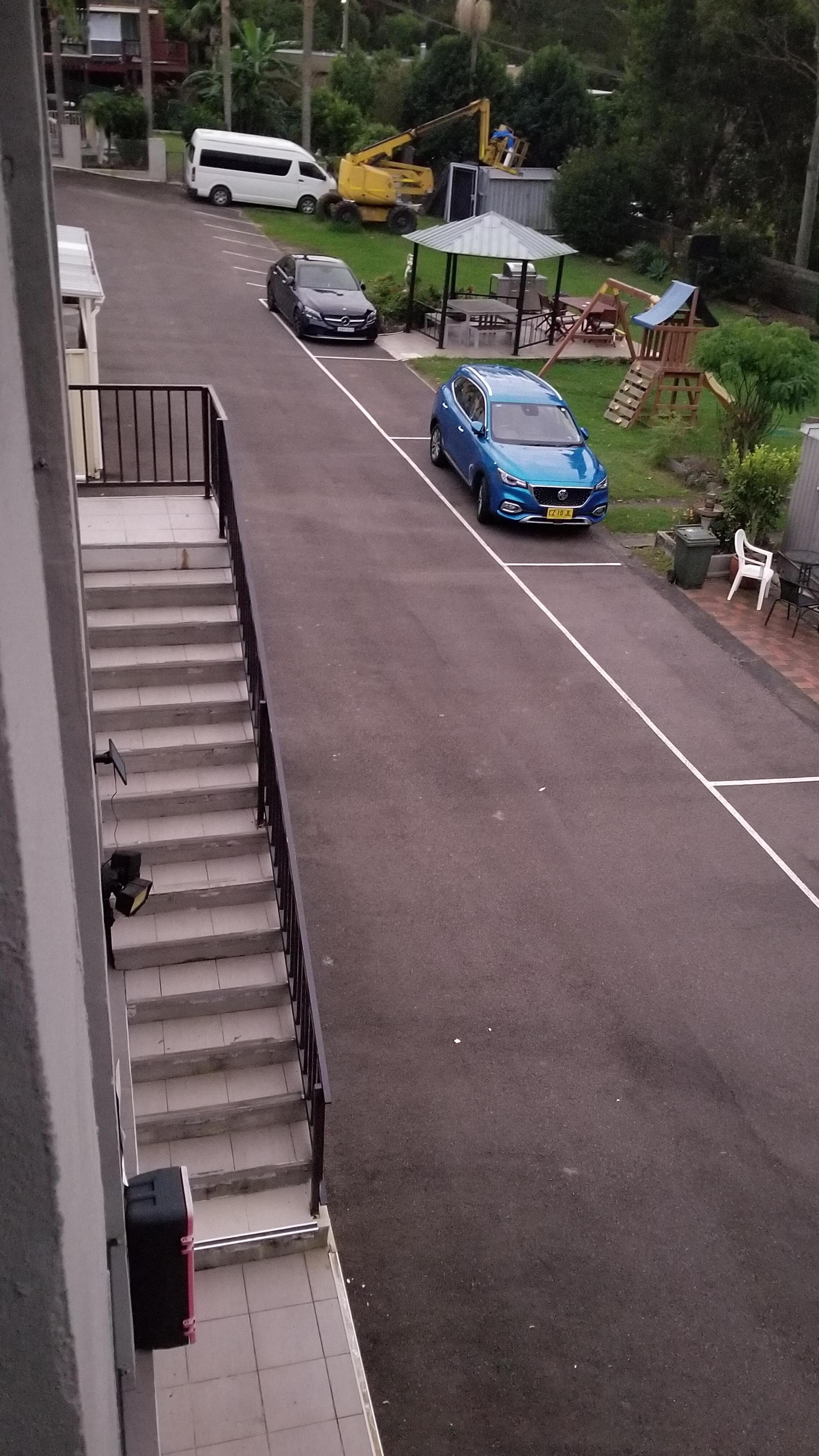 View to Carpark from top balcony outside room