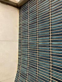 Another photo of the shower showing how yellow the tiles are from not being cleaned. A little bit of bleach goes a long way