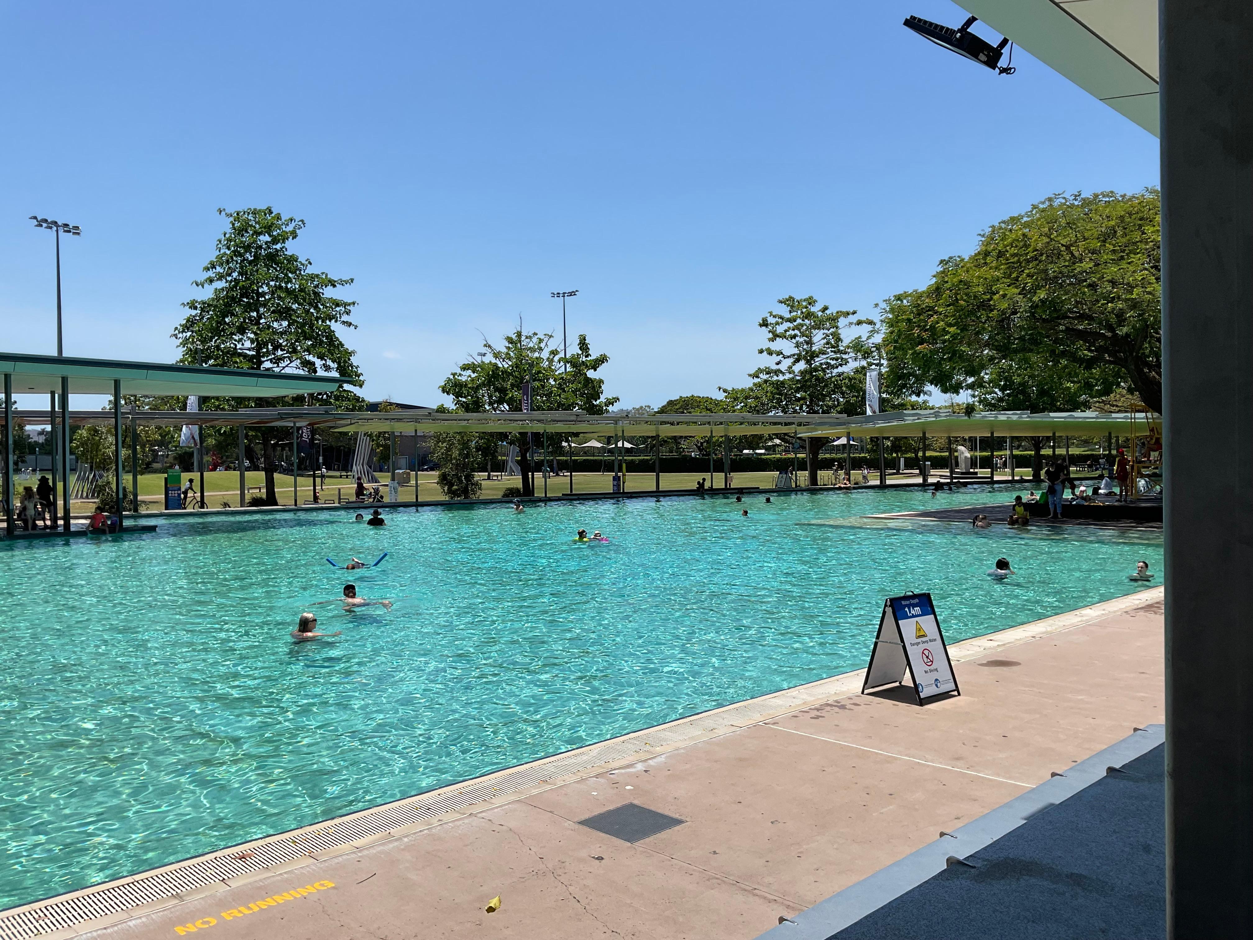 Images of the pool next to the apartment block.