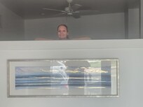 Partition separating the bedroom from the sitting area....no view, Kim standing on bed to look over wall