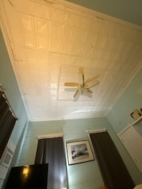 Tin ceiling in bedroom