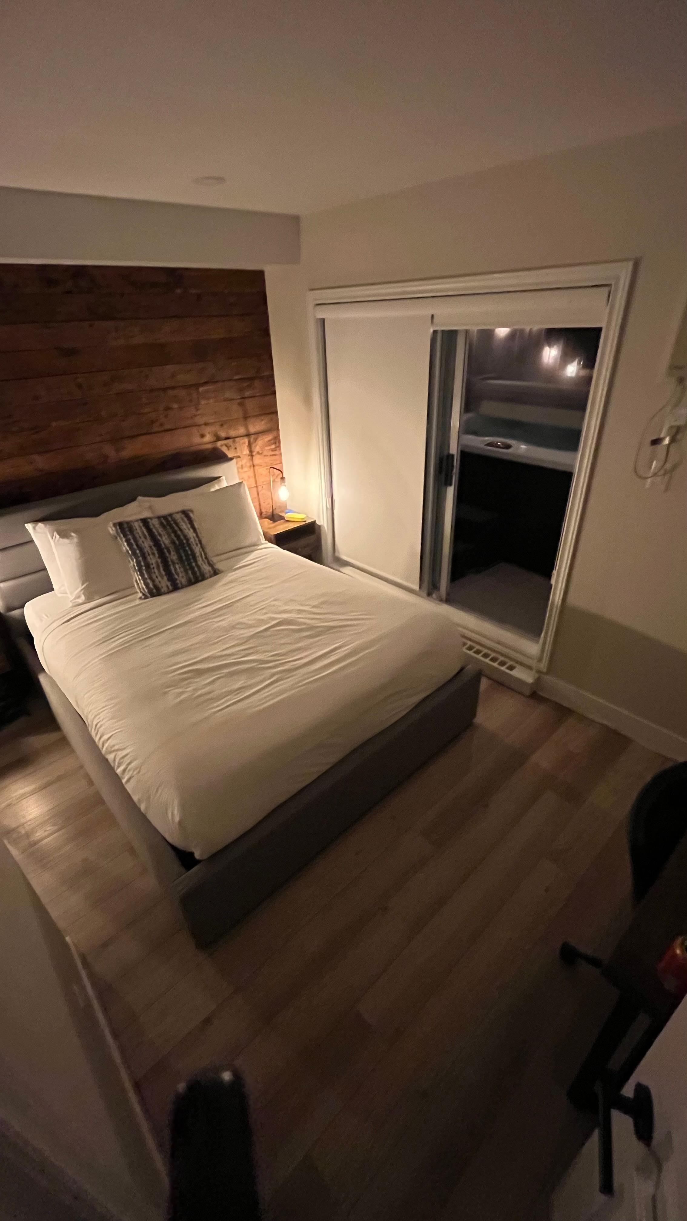 Tight bedroom like a nice remodel in a 1800's Laneway house! No space for any kind of chest of drawers and only half a small closet to hang your stuff as the other half is full of a hot water tank!!!
Crazy! who hired this Architect??And Builder?!?!?