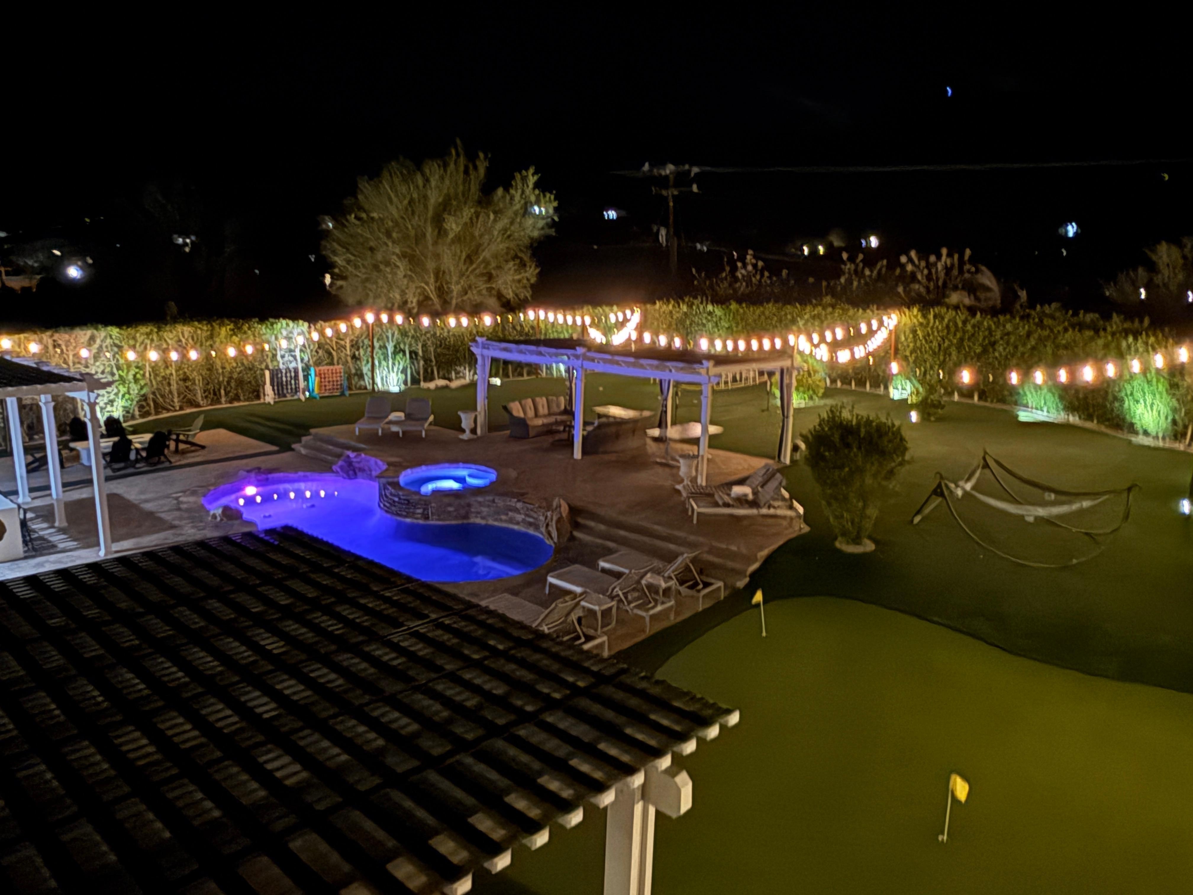 View of backyard from guest room balcony. 