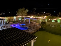 View of backyard from guest room balcony.