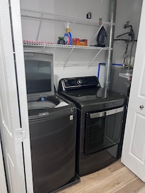 Full size washer in hallway