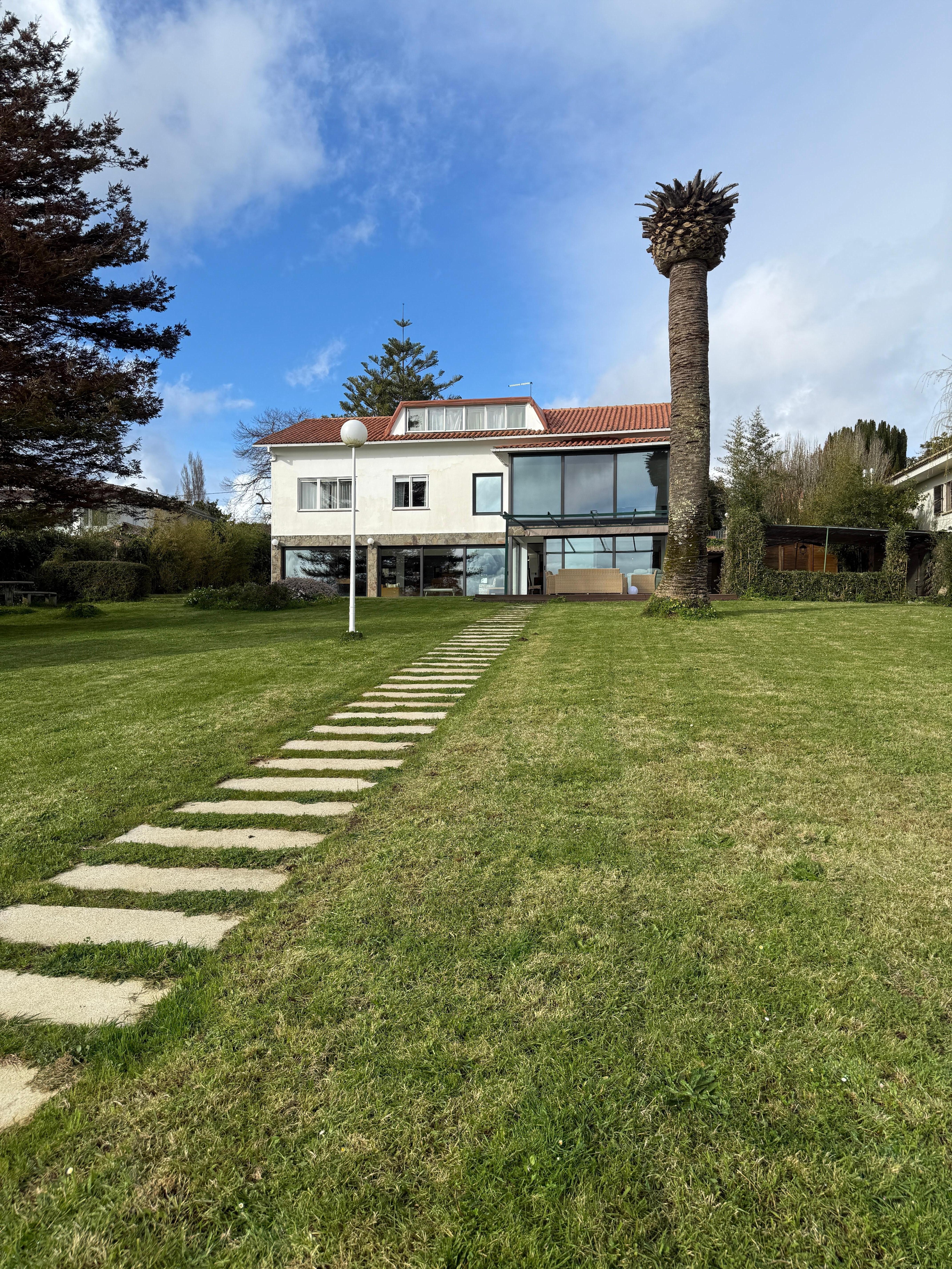 Looking from the beach to the back of house