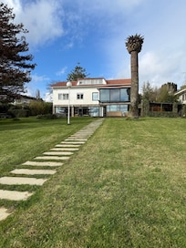 Looking from the beach to the back of house