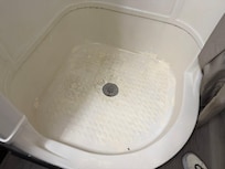 Calcium/Lime Buildup in shower
Rm 125