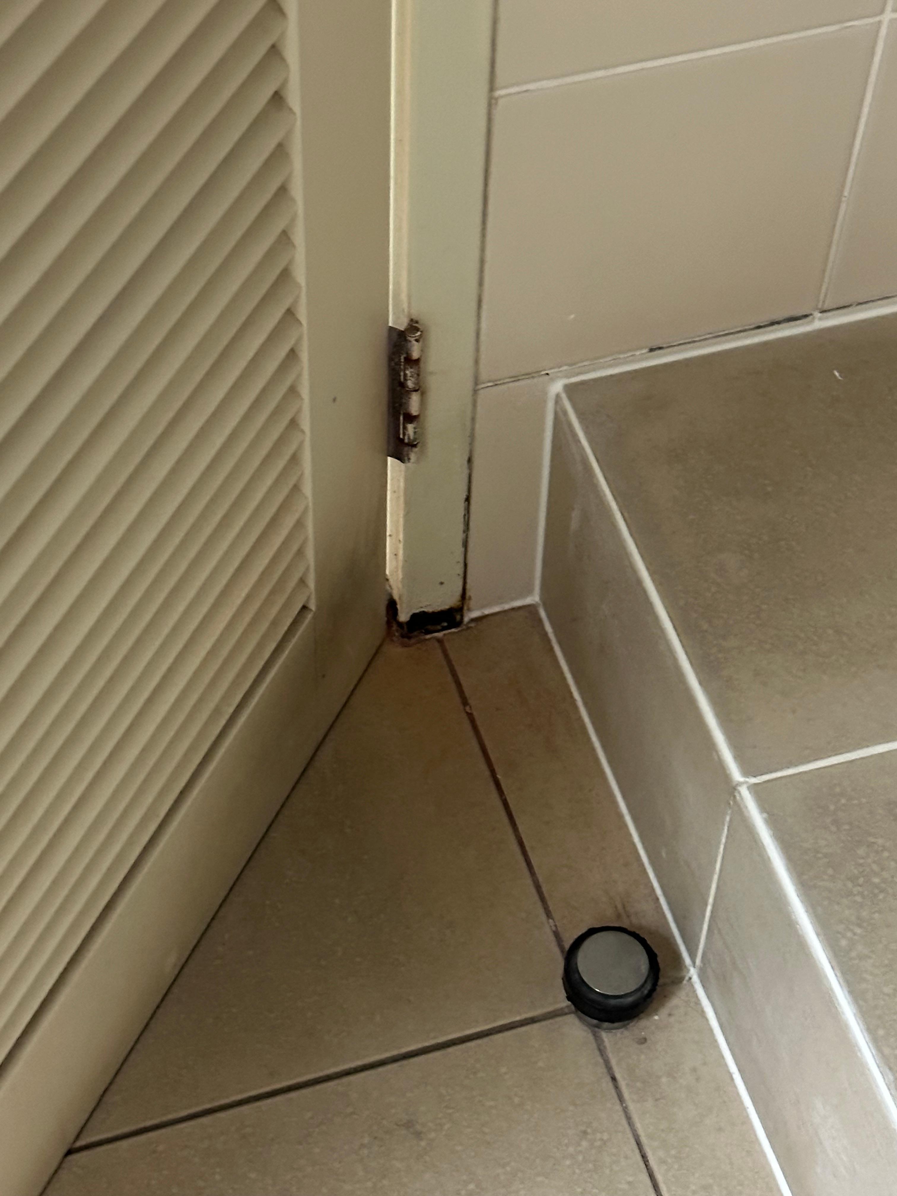 bathrooms show residue of persistent “flooding”