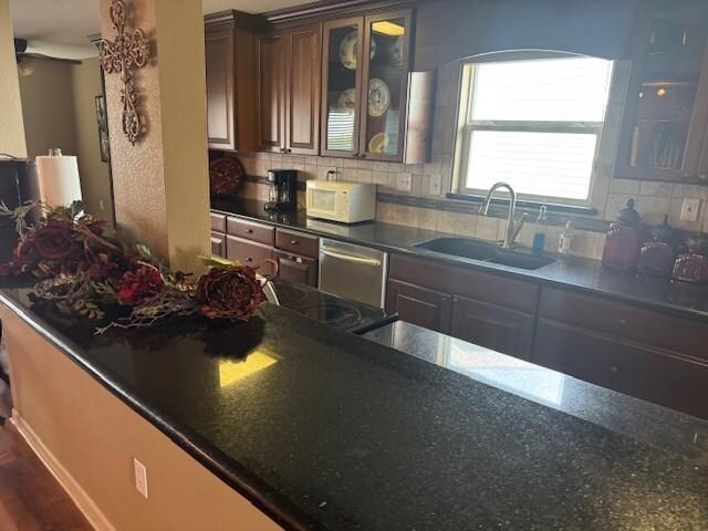 kitchen nice but dark needs updated lighting