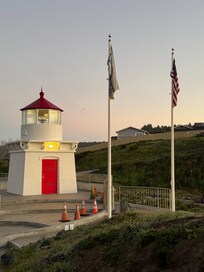 Lighthouse at the base of the deiveway