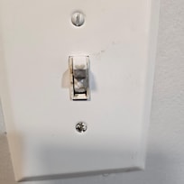 All the plugs and switches have black stuff.