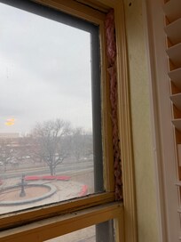 Old, exposed insulation on the windows