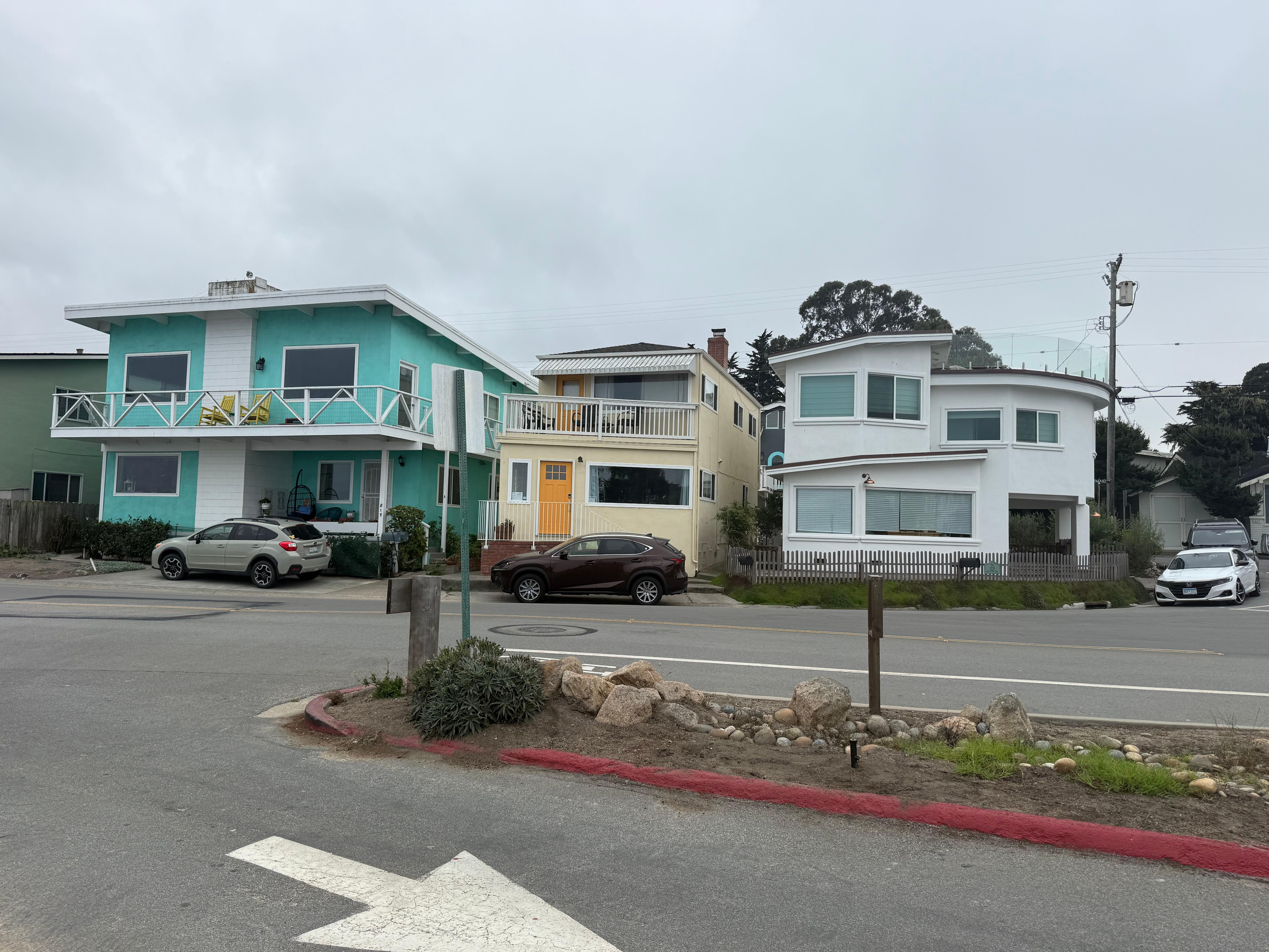 From across the street - yellow front door