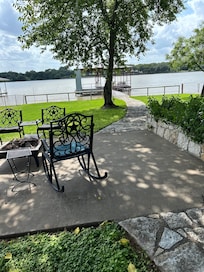 Coffee every morning from this little patio beneath the tree.