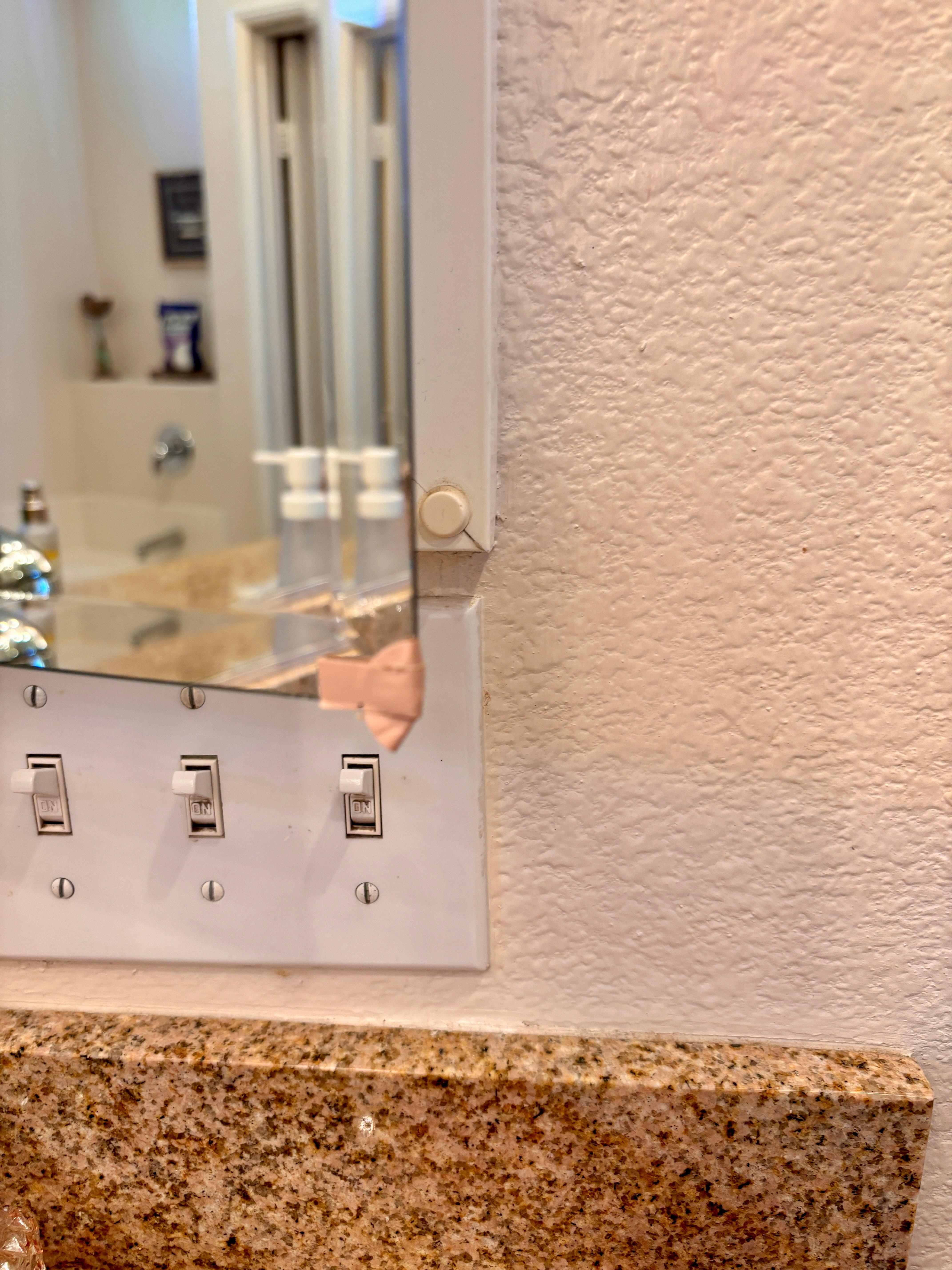 Bandaid on broken mirror 