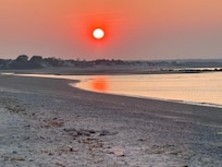 Sunset walk along quiet, private beach