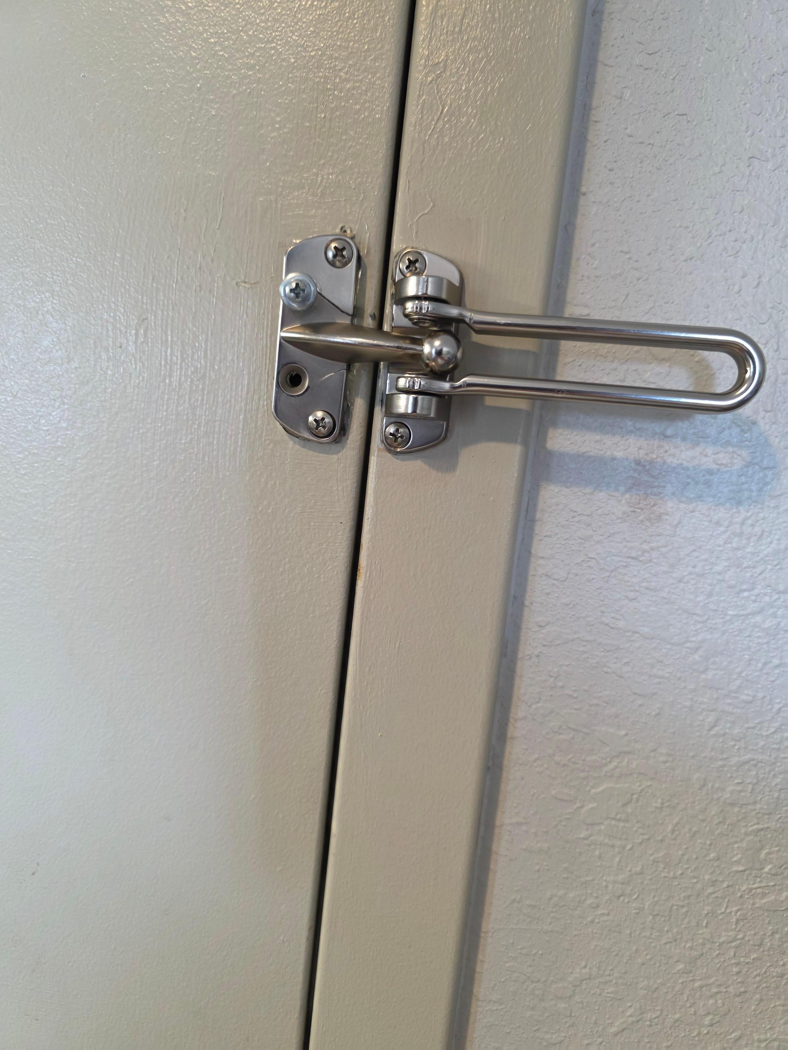 Bar on door is cracked! And the screw holes are jacked.