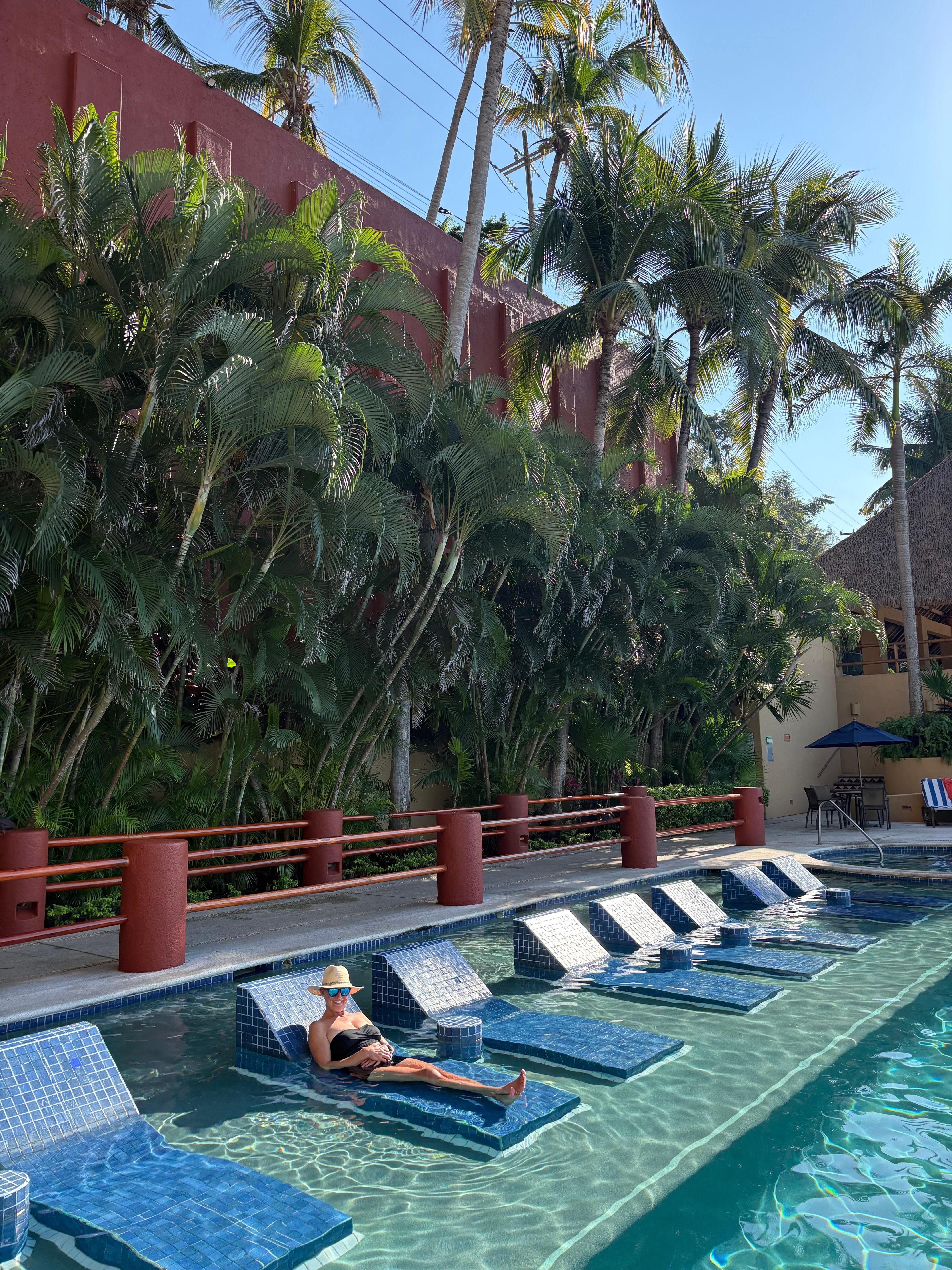 Pool loungers in the water