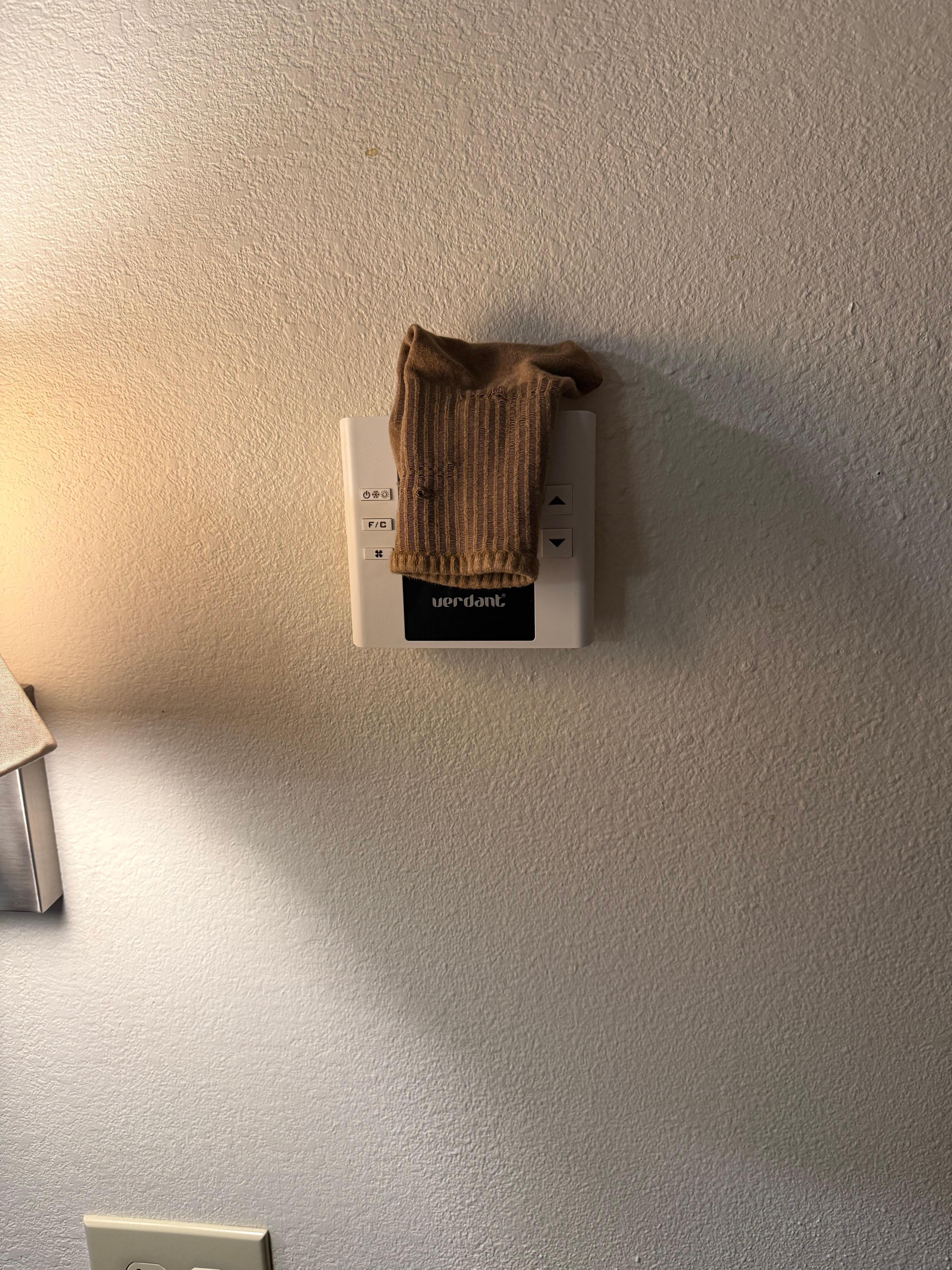 A dirty sock was left behind from previous customer. 