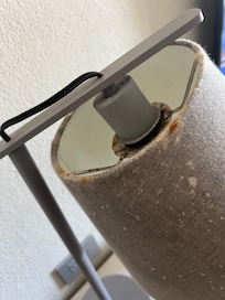 Rusty and dusty lamp.