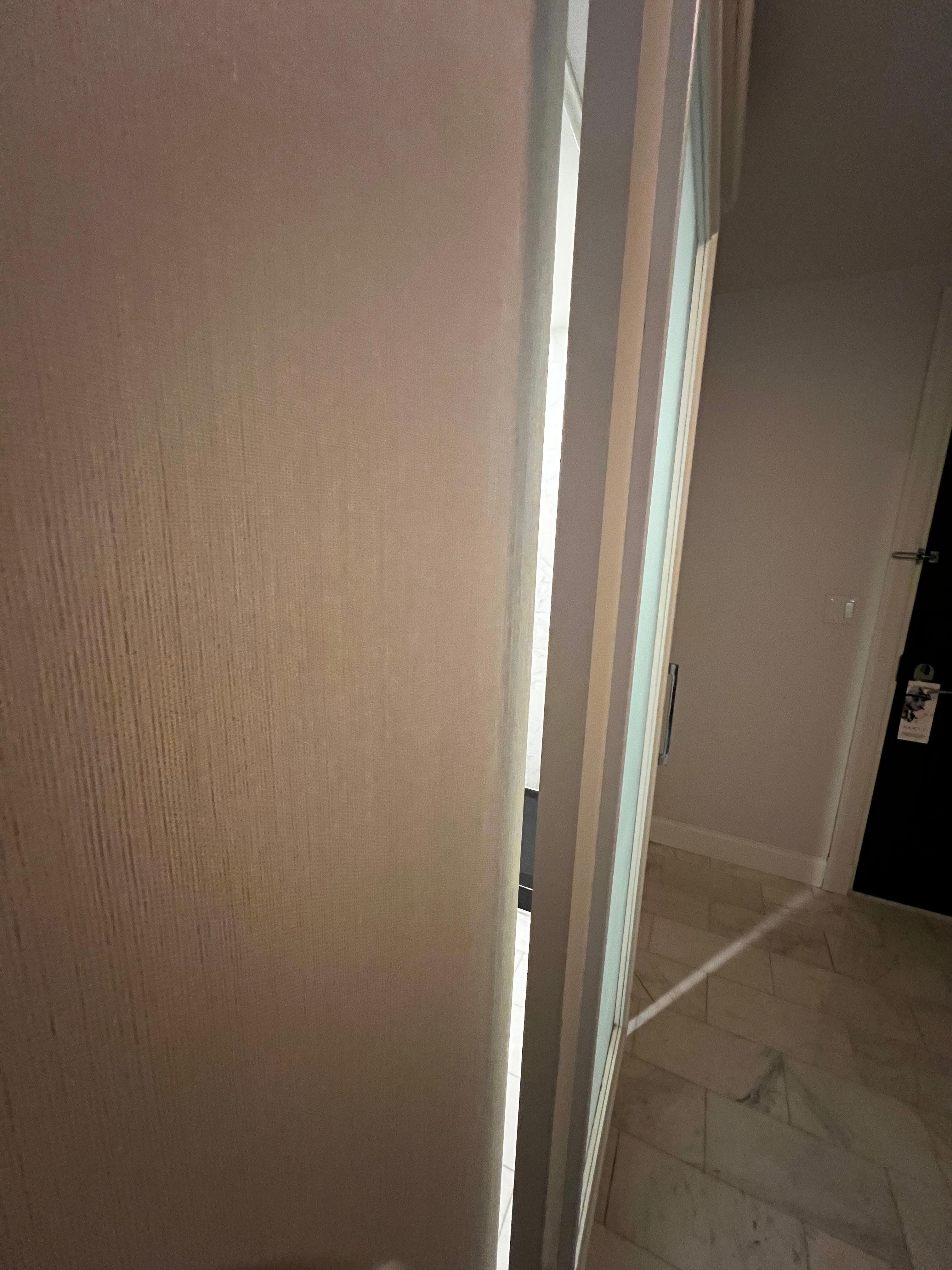 Can see straight into the shower, and on the other side, you can see straight to the toilet. 