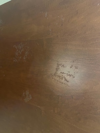 Nail polish and glue on the desk