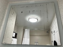 Old mirror with weird markings.