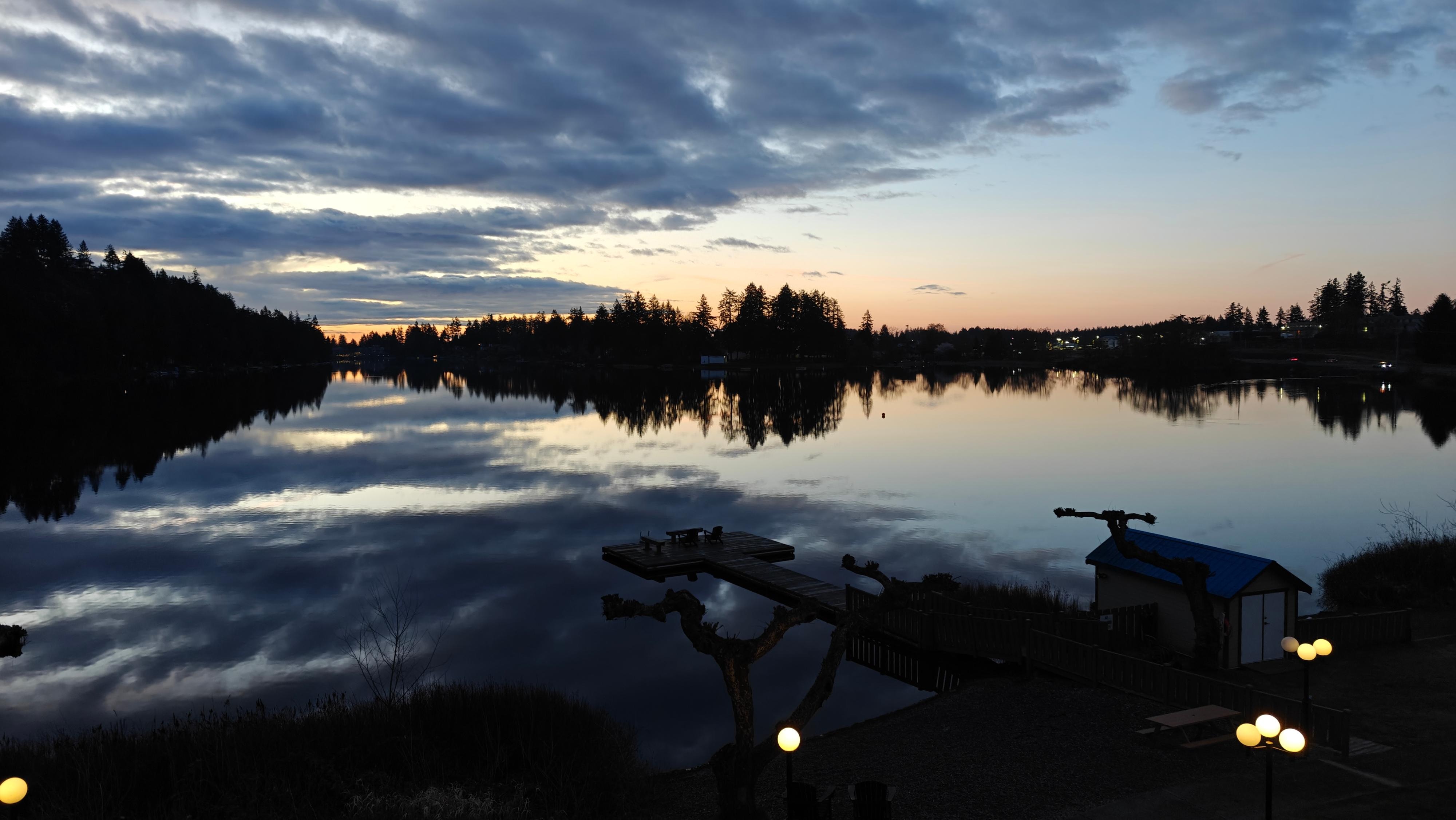 view of lake at sunrise (swimming available in summer weather)