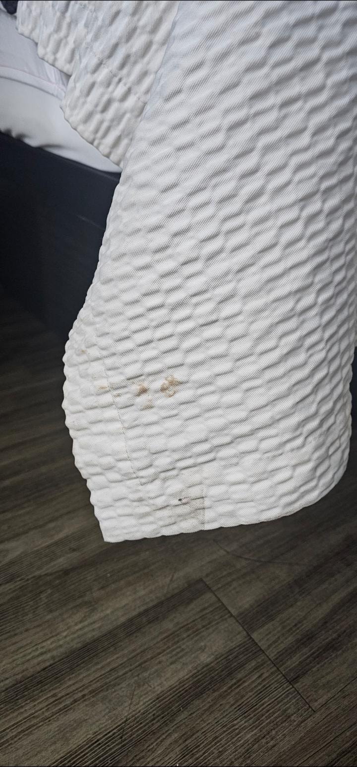 Stained bedspread 