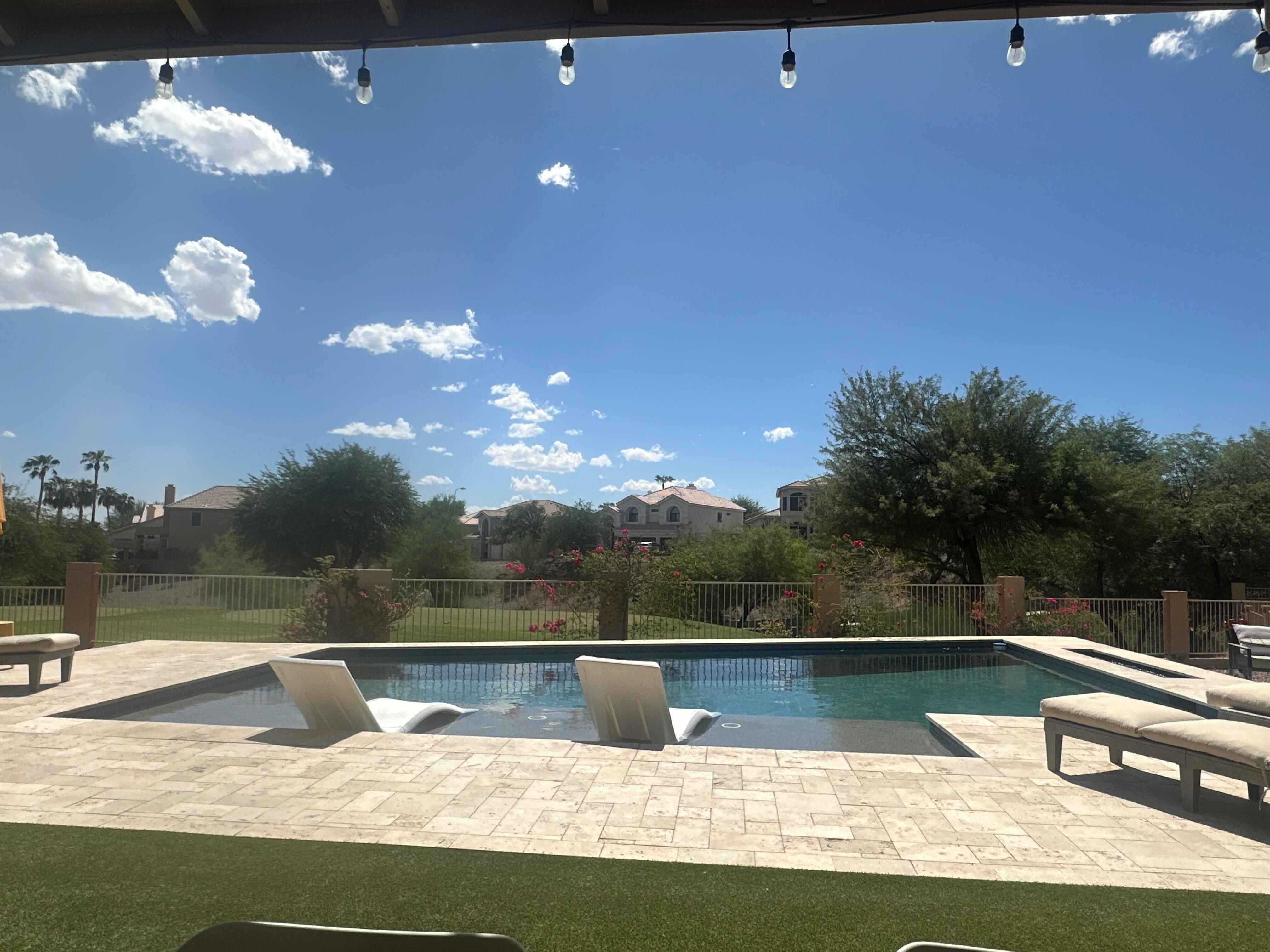 Lovely pool overlooking golf course l