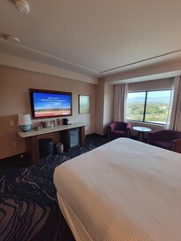 Large TV with a view of mountains