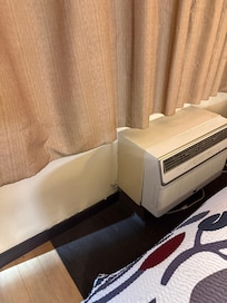 Paint and drywall under the unit was moldy and coming off