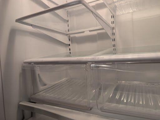 Wrong shelf in the fridge, not sitting flat, everything put on there rolled out the door