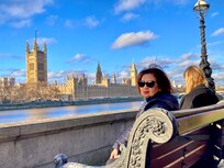 In front of the hotel by the Thames River