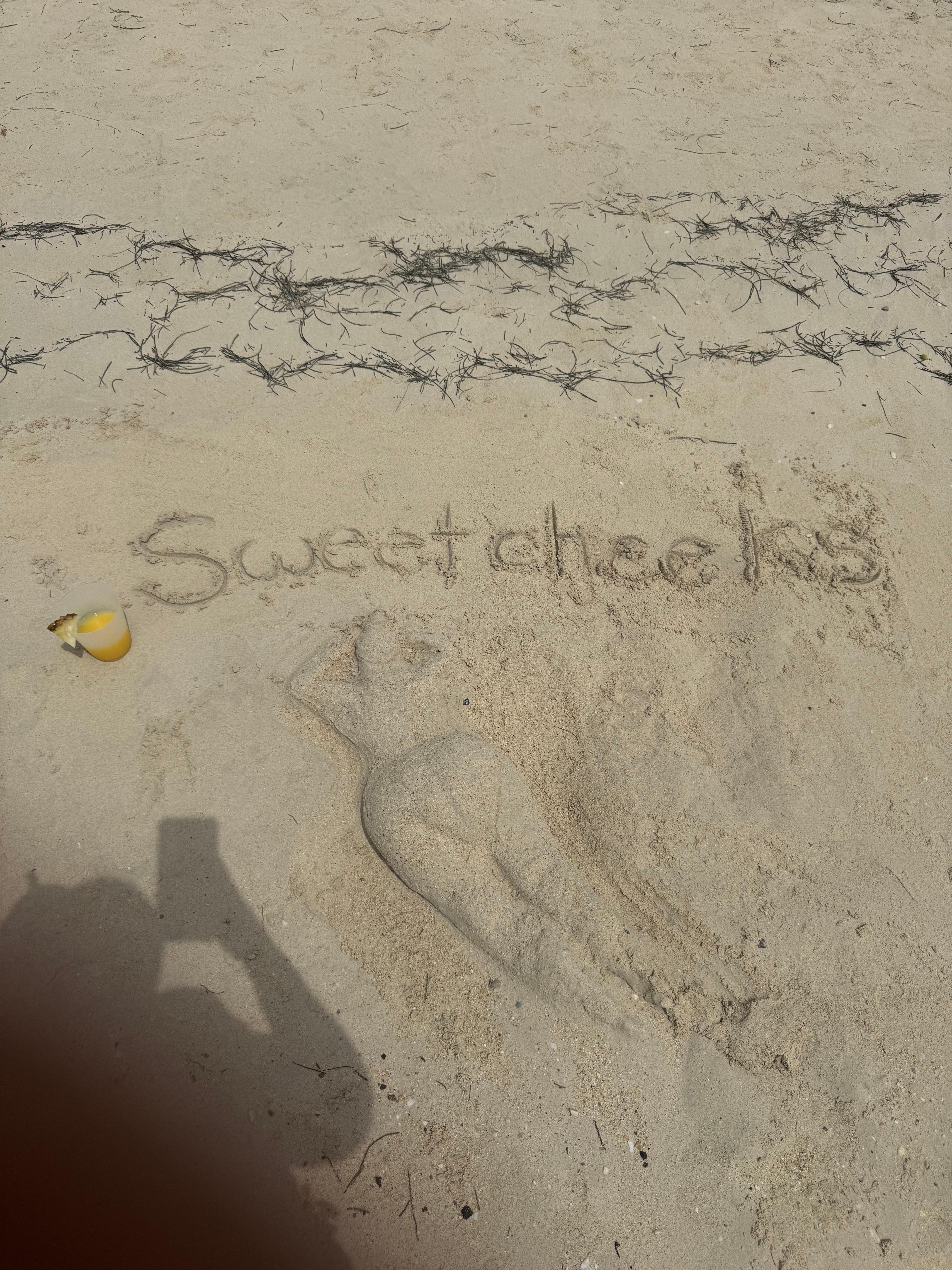 My husband sculpted me on the sand!